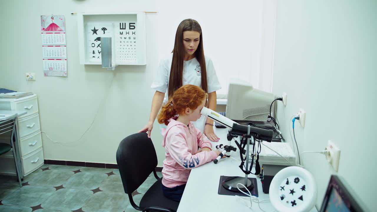 Doctor checking girl. Doctor examines little girl patient