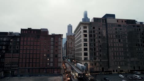 chicago cityscape of downtown loop as elevated subway passes through buildings