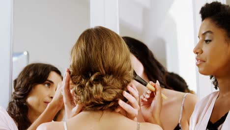 happy bridesmaids are getting bride ready for wedding 4k 4k