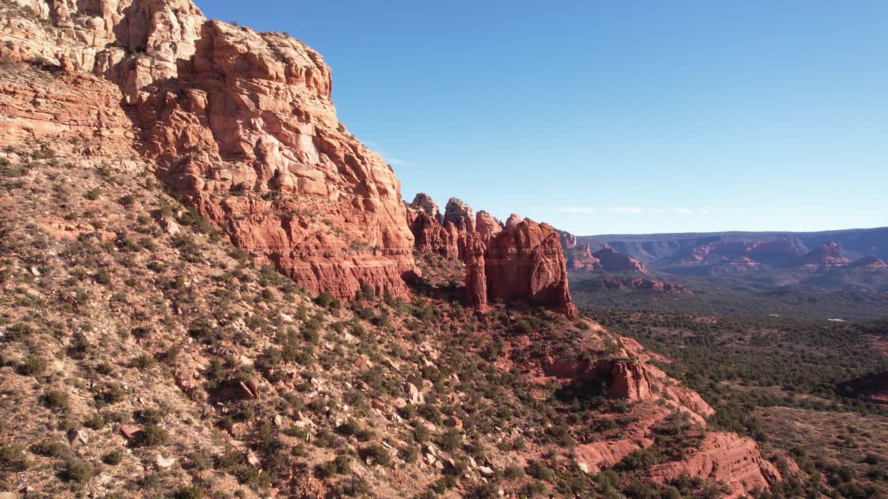 Red Sandstone Hills, Cliffs and Spire Rock Formations Above Sedona Arizona USA, Drone Aerial View
