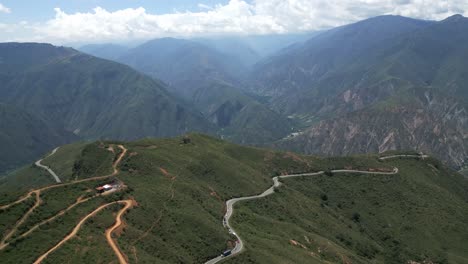 Drone-Shot-of-Mountain-Road-Above-Chicamocha-Canyon-in-Countryside-Landscape-of-Colombia