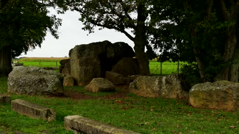 a dolmen is a megalithic burial chamber from the neolithic that consists of three standing stones, covered by a capstone