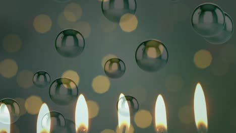 animation of lit candles with flickering spots of light