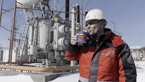 worker at a power plant taking a break