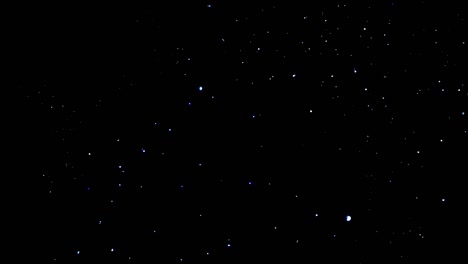 Stars-floating-and-twinkling-on-black-background