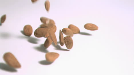 almonds falling in super slow motion