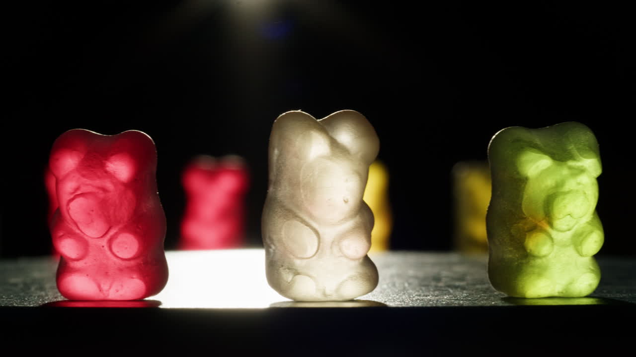Colorful Gummy Bears in Spotlight