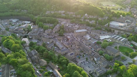 Short-slow-moving-drone-shot-of-todmorden-town-center-as-the-sun-was-setting-on-a-calm-mid-week-evening