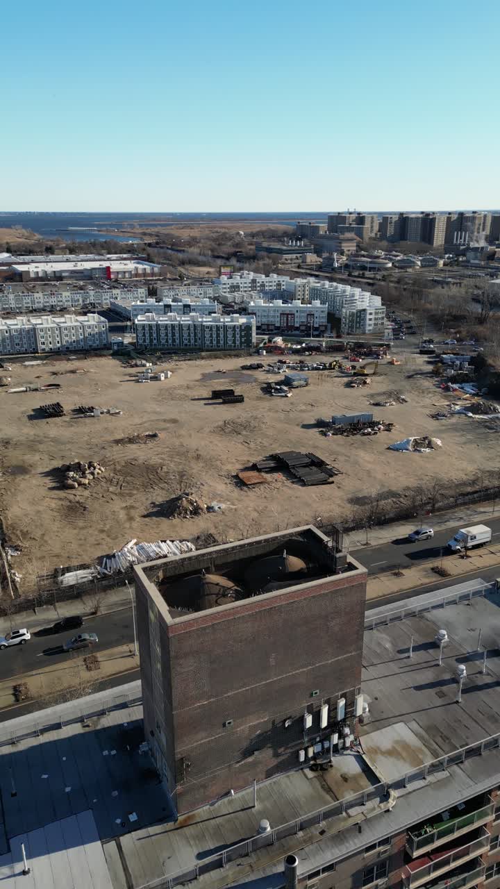 Aerial view over Brooklyn featuring Belt Parkway, Shirley Chisholm State Park, Spring Creek Beach, Pennsylvania Ave, Flatlands Ave, and Howard Beach.