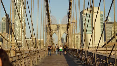 walking on the brooklyn bridge in new york city