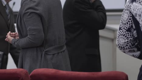 businessmen go to the conference hall before hearing the business project 2