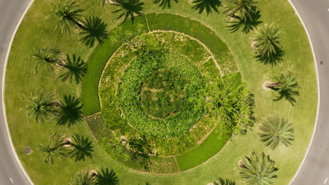 zooming out of a green roundabout in vietnam