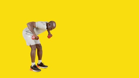 strong african man doing dumbbell rowing exercises