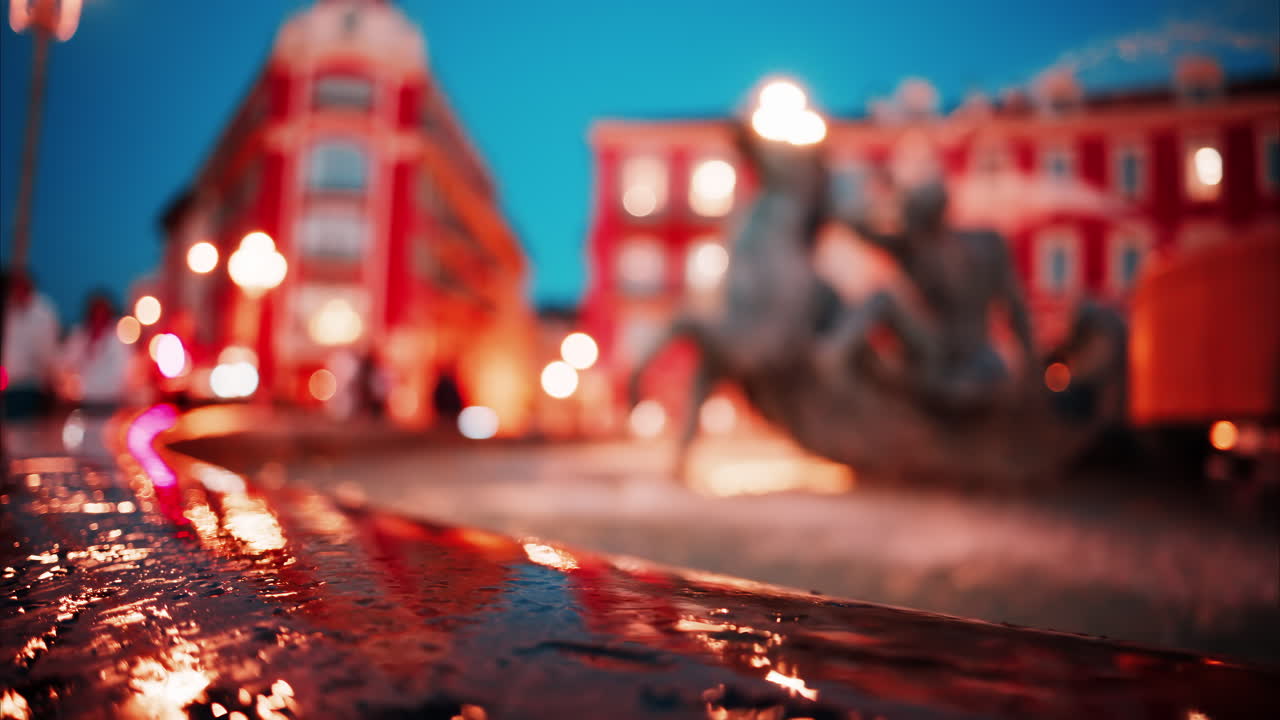 Nice, France - October 8, 2024: Close up of the Fontaine du Soleil at Place Massena in the evening