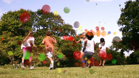 moving spots of coloured light with children running