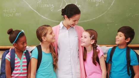 teacher posing with her students