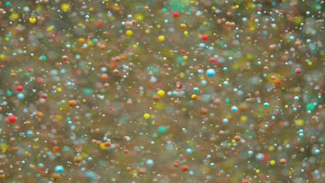 movimiento lento colores brillantes burbujas de aceite hermosa pintura color del universo movimiento de primer plano multicolor. pintura acrílica. superficie fantástica. abstracto pintura de colores estructura de metamorfosis burbujas coloridas
