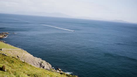 the irish coastline stretches out in front, a perfect blend of serenity and rugged beauty