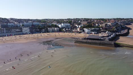 high panning point of view broadstairs kent seaside town and beach drone aerial view
