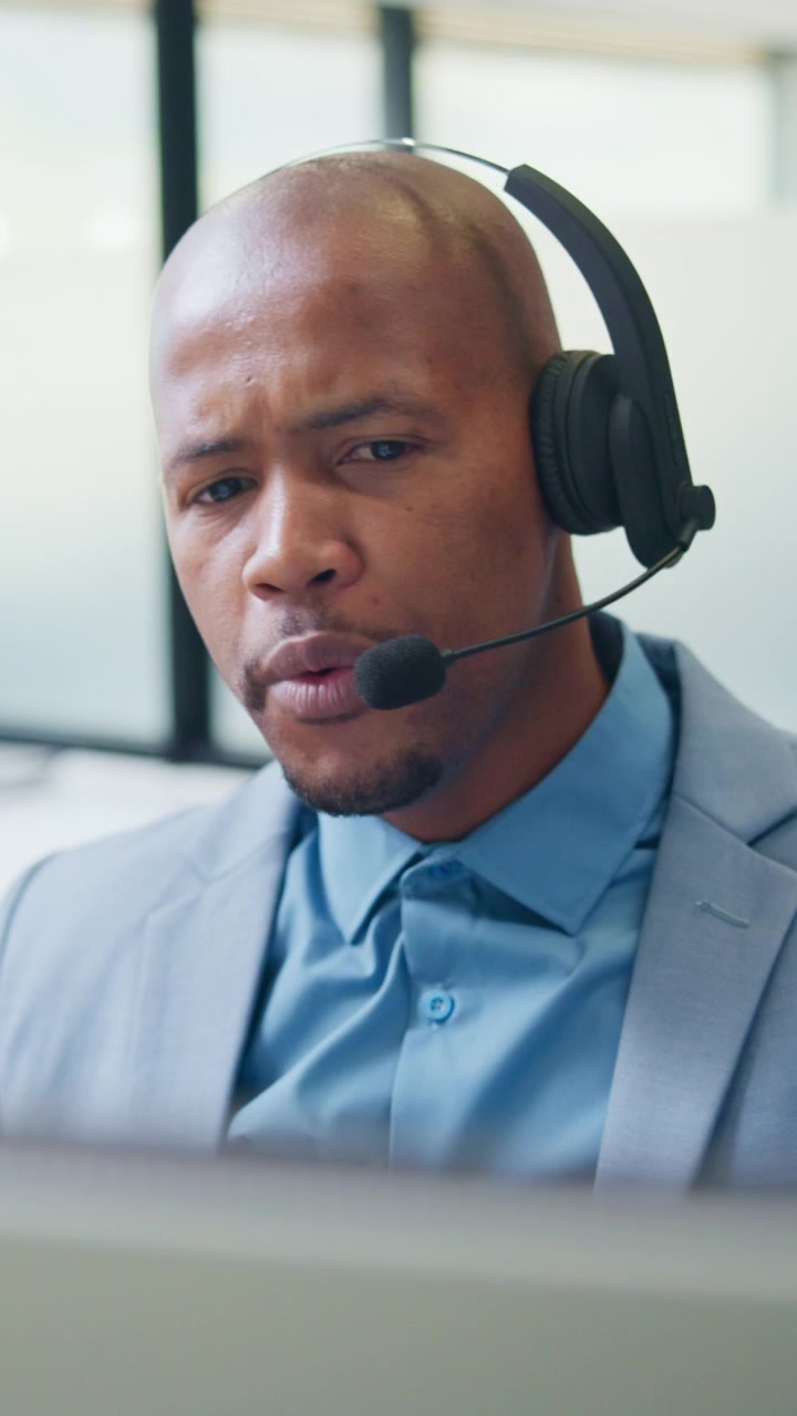 Professional Customer Service Representative Talking on Headset in Office