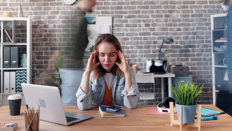 overwhelmed woman in office
