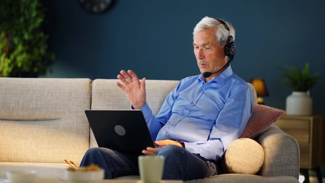 Senior Man Having a Video Call on Laptop at Home