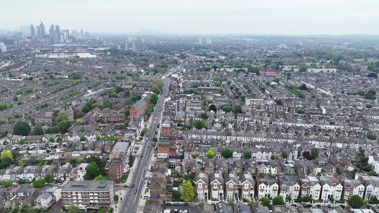 Ascending above South West London with the city skyline in the distance