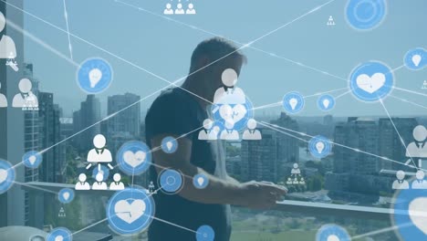 Animation-of-network-of-connections-with-icons-over-man-using-smartphone