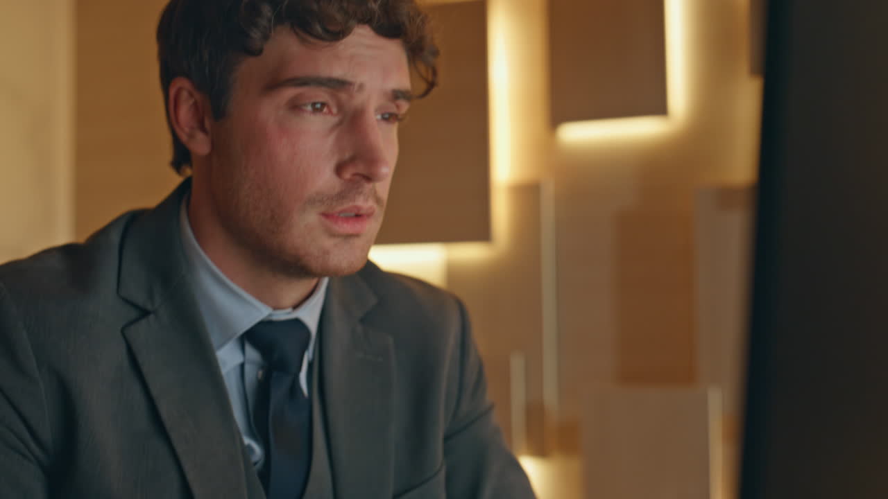 Man fingers typing keyboard working at late closeup. Executive rubbing temples