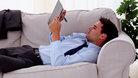 businessman writing something on a document