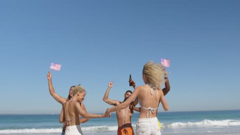 young adult friends dancing at the beach 4k