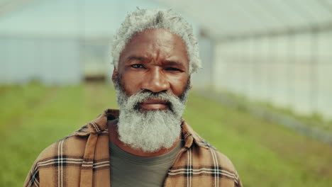 man, face and smile in greenhouse for farming