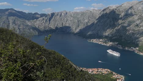 Mountain-view,-sea-and-cruise-ship,-establishing-shot,-Kotor,-Montenegro