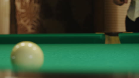 playing billiard game. white pool balls close-up on green billiards table for start to play. russian game, russian pyramid. billiard balls with numbers on a pool table. billiards team sport.high quality 4k footage