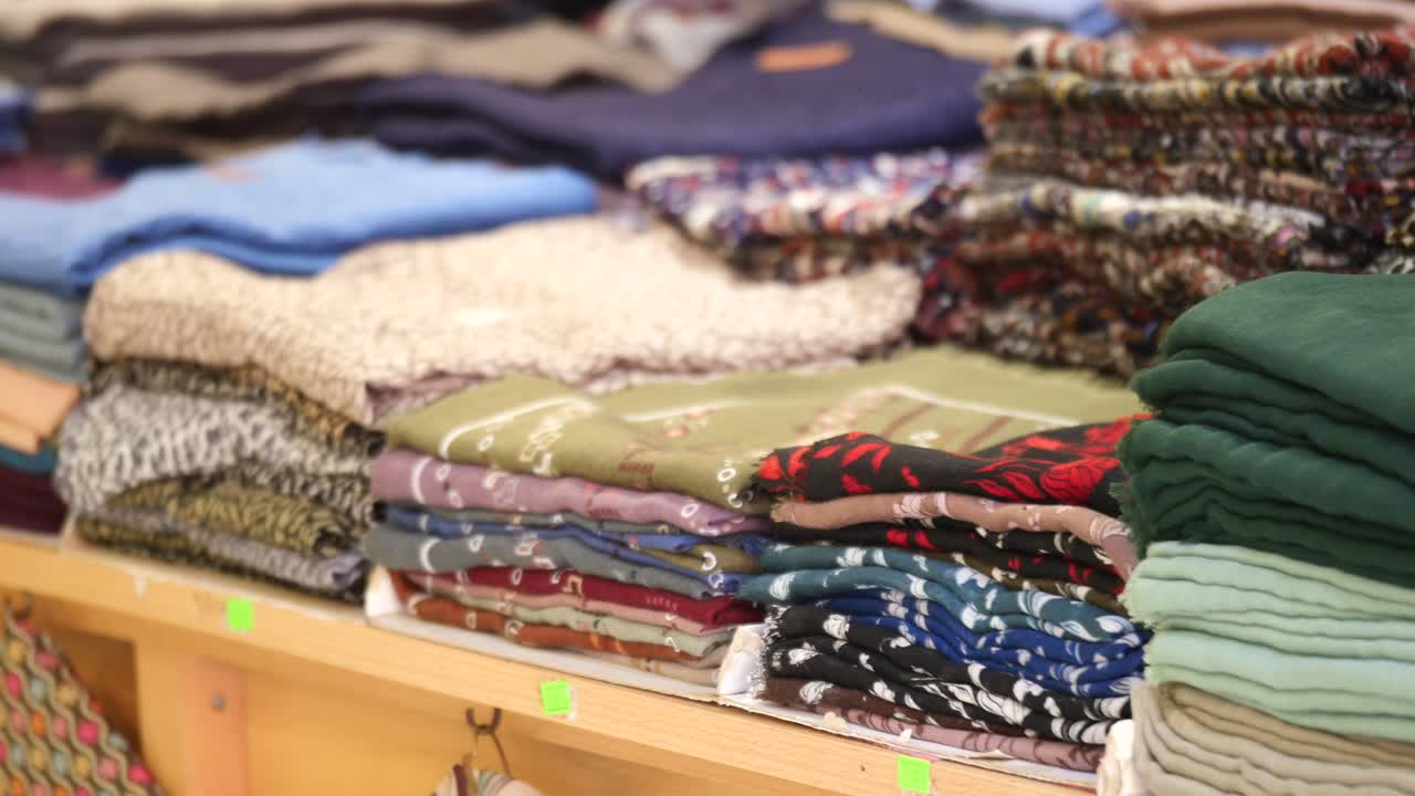 Stacks of Scarves and Textiles
