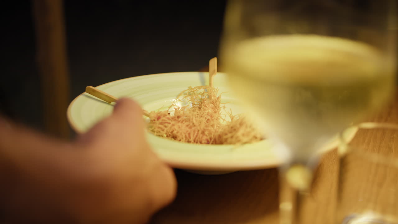 Waiter Serving The Dish Of The Restaurant For Dinner