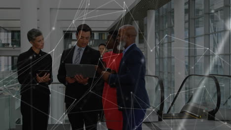 Web of connections against people working in an office