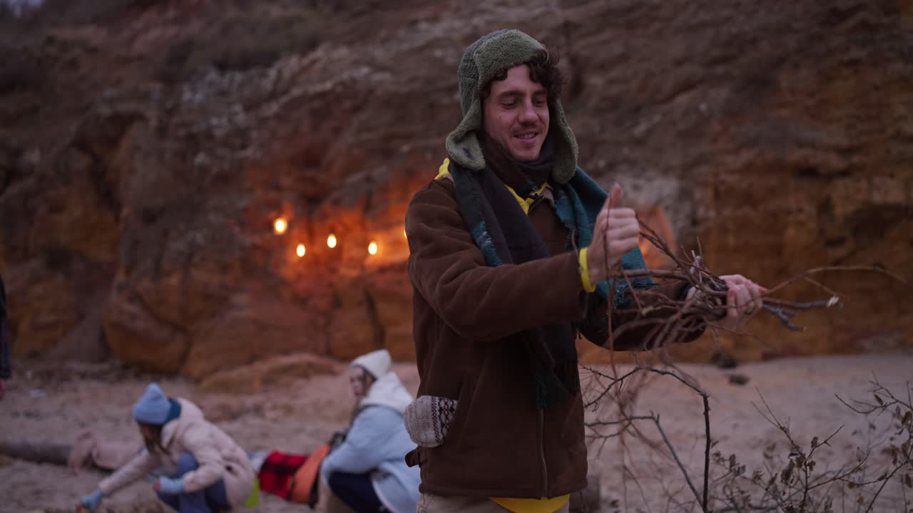 Friends Camping by the Beach at Night
