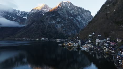 Wide-orbit-shot-of-Hallstatt-Austria-during-sunrise