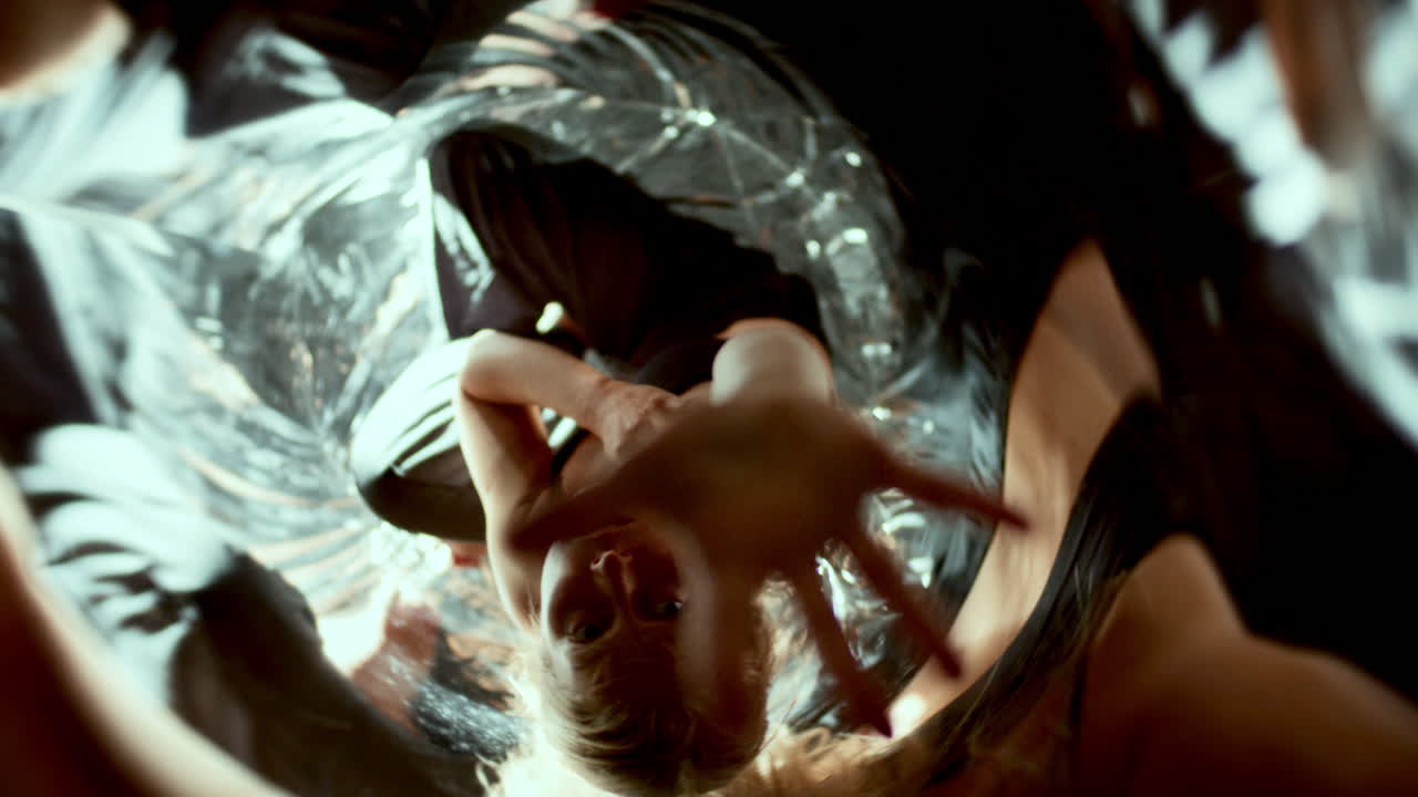 Female Dancer Giving Experimental Performance among Abstract Distortions