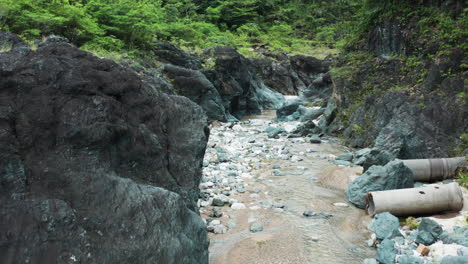 rocky river nizao in the dominican republic - aerial drone shot