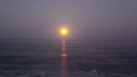 full moon over sea 4k