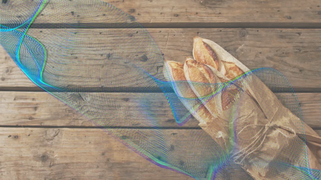 Onda a rete digitale che emerge da sinistra scorrendo su un tavolo di legno vicino a baguette e si sovrappone alla scena.