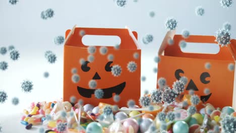 Animation-Von-Halloween-Smiley-Orange-Boxen-Mit-Mehreren-Covid-19-Zellen,-Die-Auf-Weißem-Hintergrund-Schweben