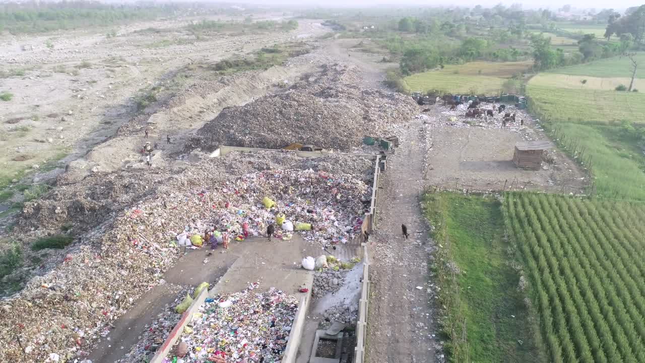 Aerial View of an Open Dumpsite in a Rural Area