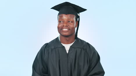 graduado, hombre negro y señalando para el futuro