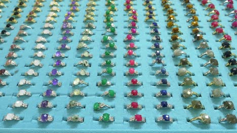 colorful gemstone rings on display