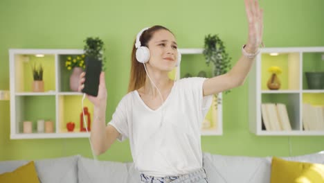 happy young woman dancing peaceful and pleasant.