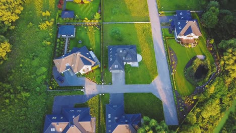 aerial photo of village of houses residential drone above view summer blue sky estate agent