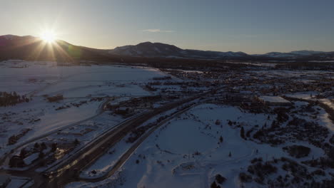 aerial tilting shot of the mountains at sunset